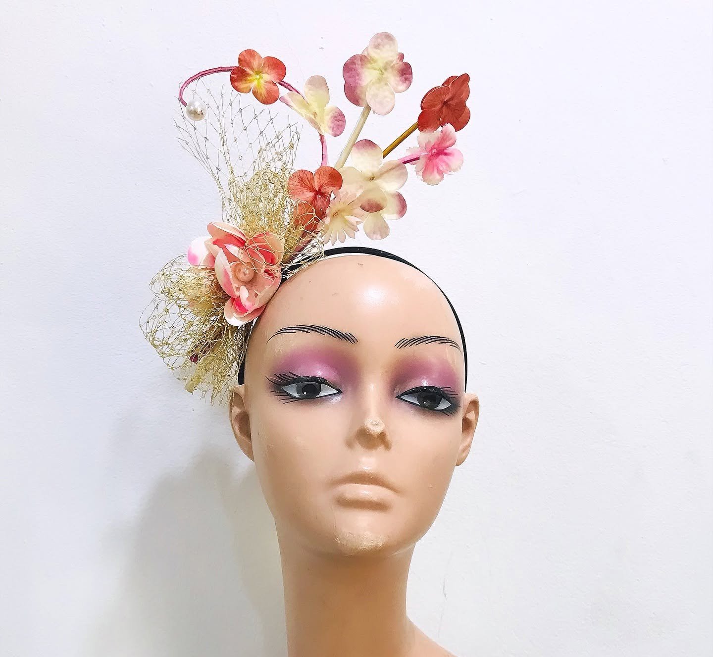 Floral sculptural headpiece